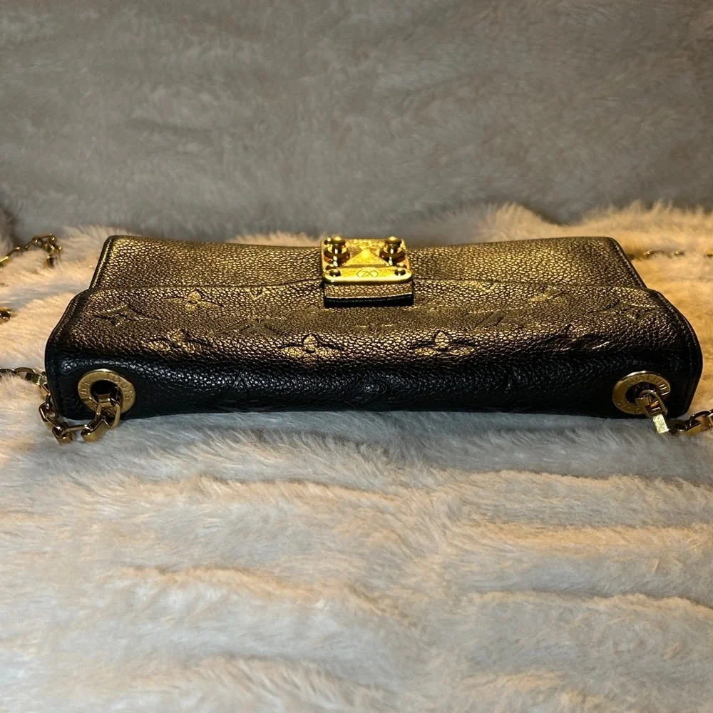 337. Louis Vuitton Saint Germain Pochette in Black Monogram Empreinte leather